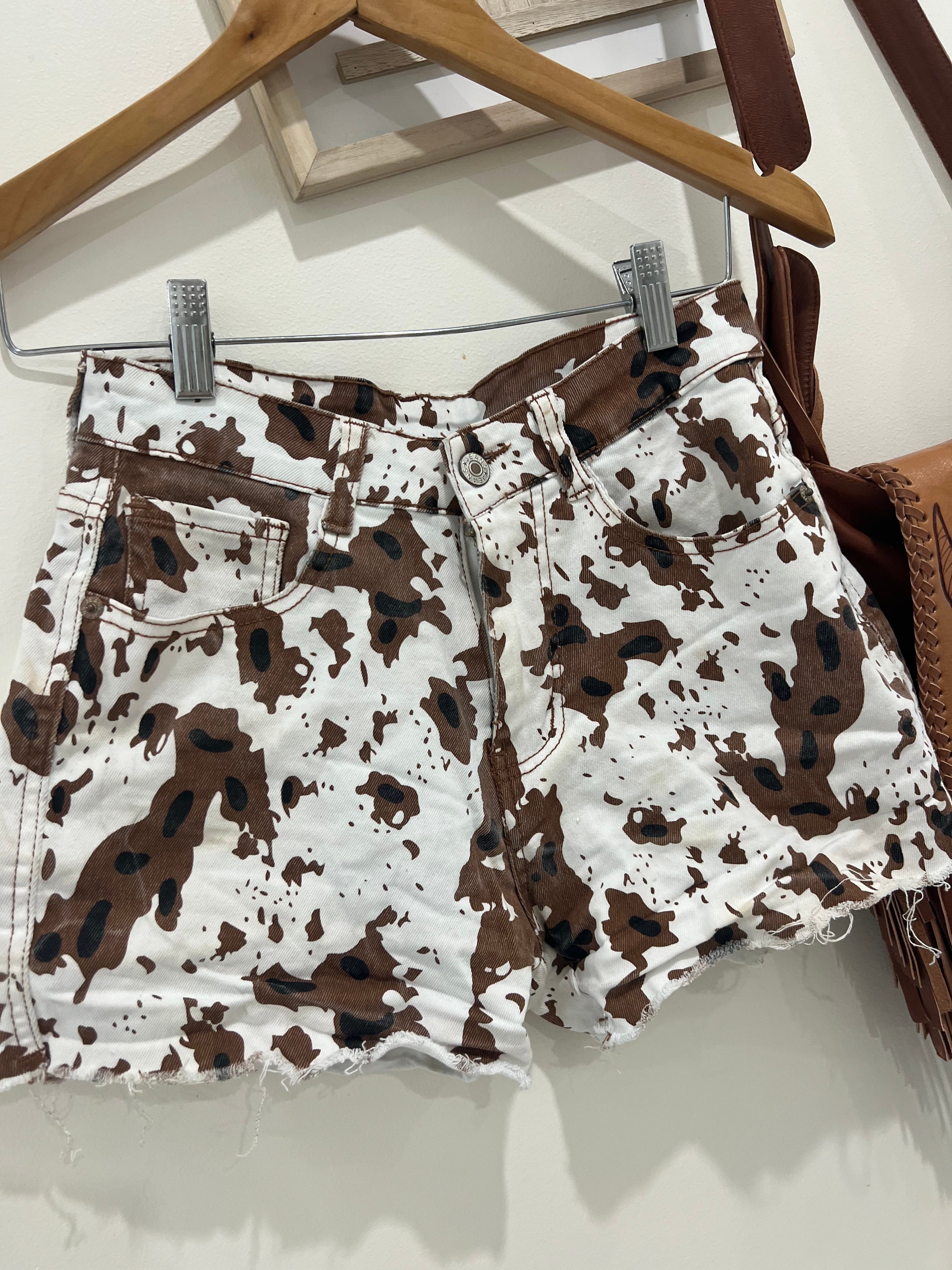 Cow print jean shorts sales